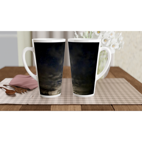 Pair of night sky ceramic latte mugs on a dining table