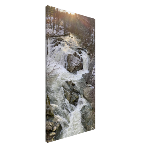 Vertical canvas with golden hour winter river waterfall and snowy forest