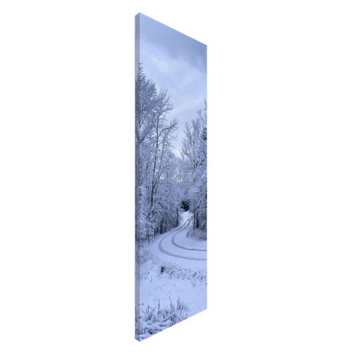 Angled side view of winter snow landscape on vertical canvas