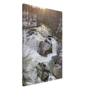 Side angle of river waterfall on premium canvas, golden sunlight overhead