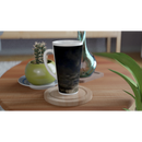 Night sky ceramic latte mug displayed on a wooden table with plants