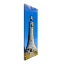 Angled view of tall stone tower canvas art with pathway leading up